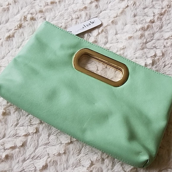 Charming Charlie Handbags - Charming Charlie Mint Green Clutch